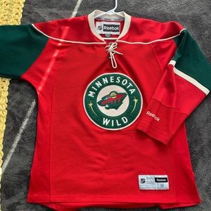 Authentic Reebok mn wild jersey, purchased at excel energy center. No lettering.